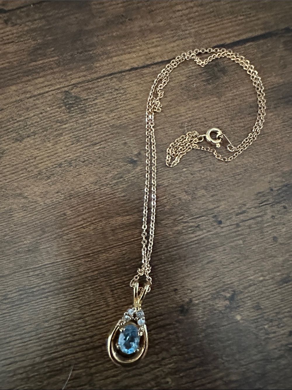 Gold-Tone Necklace with Blue Teardrop Pendant